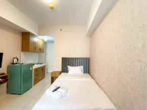 Fully Furnished Studio Springlake Summarecon Bekasi Apartment near Mall By Travelio